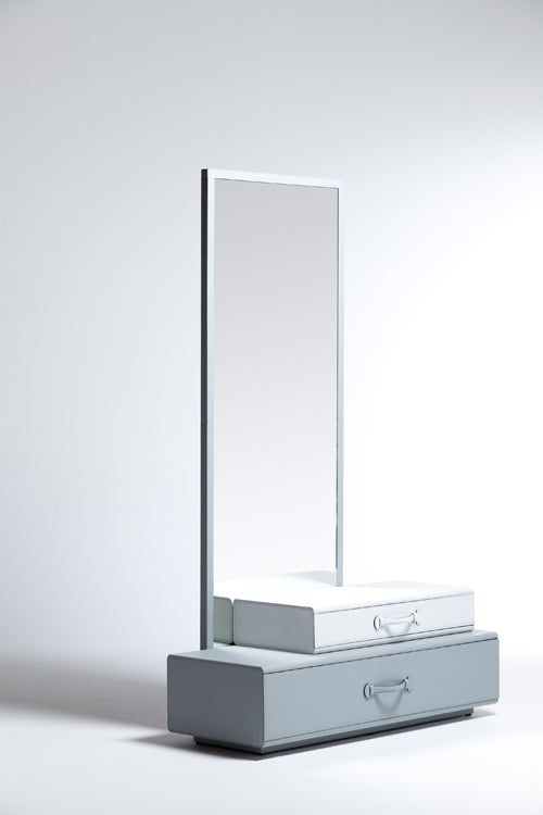 Mirror with suitcase