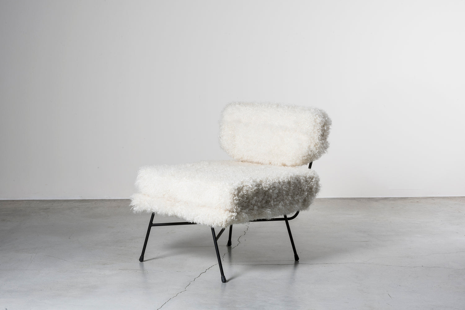 Three Elettra armchairs